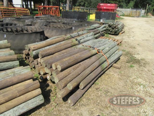 (5) bundles of treated fence posts- all 4--_0.jpg